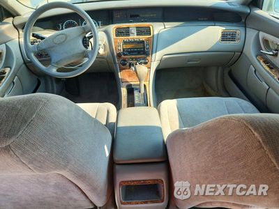 Zdjęcie 8 z 12 samochodu: 2000 TOYOTA AVALON XL VIN:4T1BF28B3YU039478 - miniatura