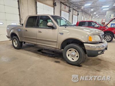 Czwarte zdjęcie samochodu z boku: 2001 FORD F150 SUPERCREW VIN:1FTRW08L01KA63111 - miniatura