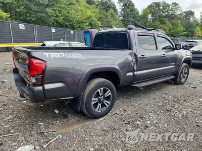 Trzecie zdjęcie samochodu z tyłu: 2019 TOYOTA TACOMA TRD SPORT VIN:3TMDZ5BN0KM064925 - miniatura
