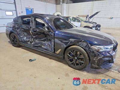 Czwarte zdjęcie samochodu z boku: 2021 BMW 540 XI VIN:WBA73BJ09MWX10952 - miniatura
