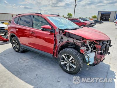 Czwarte zdjęcie samochodu z boku: 2016 TOYOTA RAV4 XLE VIN:JTMWFREV9GJ066312 - miniatura