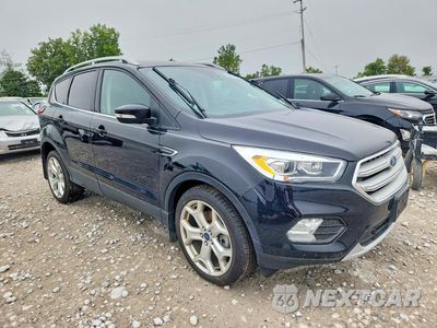 Czwarte zdjęcie samochodu z boku: 2019 FORD ESCAPE TITANIUM VIN:1FMCU9J99KUC48211 - miniatura