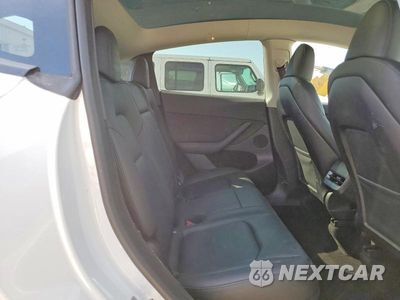 Zdjęcie 10 z 12 samochodu: 2023 TESLA MODEL Y VIN:7SAYGDEE7PA065353 - miniatura