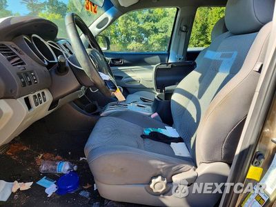 Zdjęcie 7 z 13 samochodu: 2014 TOYOTA TACOMA V6 VIN:3TMLU4EN4EM155152 - miniatura