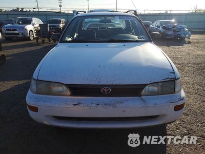 Piąte zdjęcie samochodu w środku: 1993 TOYOTA COROLLA DX VIN:2T1AE09E5PC009314 - miniatura