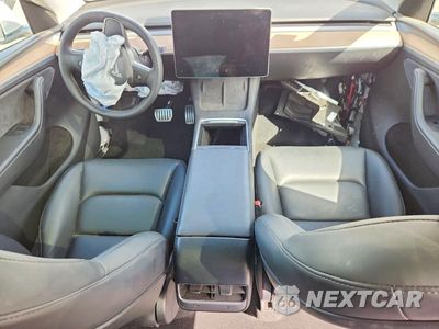 Zdjęcie 8 z 12 samochodu: 2024 TESLA MODEL Y VIN:7SAYGDEF3RA329244 - miniatura