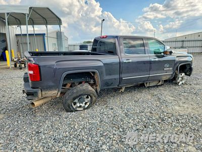 Trzecie zdjęcie samochodu z tyłu: 2015 GMC SIERRA K3500 SLT VIN:1GT423E88FF556641 - miniatura