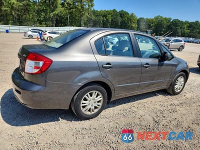 Trzecie zdjęcie samochodu z tyłu: 2012 SUZUKI SX4 LE VIN:JS2YC5A32C6300677 - miniatura