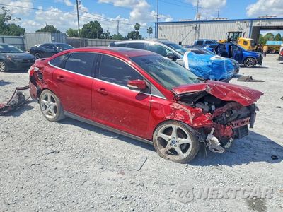 Czwarte zdjęcie samochodu z boku: 2014 FORD FOCUS TITANIUM VIN:1FADP3J27EL153193 - miniatura