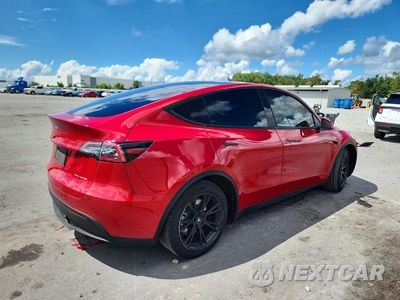 Trzecie zdjęcie samochodu z tyłu: 2021 TESLA MODEL Y VIN:5YJYGDEE2MF294552 - miniatura