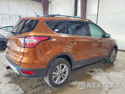 Trzecie zdjęcie samochodu z tyłu: 2017 FORD ESCAPE SE VIN:1FMCU9G97HUE67765 - miniatura
