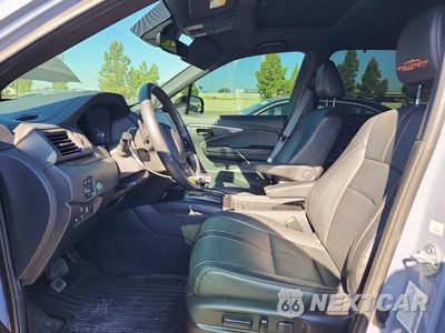 Zdjęcie 7 z 13 samochodu: 2022 HONDA PASSPORT TRAIL SPORT VIN:5FNYF8H6XNB010052 - miniatura