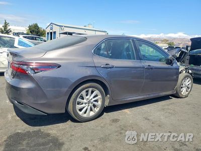Trzecie zdjęcie samochodu z tyłu: 2023 TOYOTA CAMRY LE VIN:4T1C11AK8PU814752 - miniatura