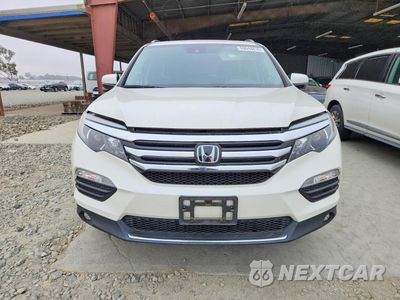 Piąte zdjęcie samochodu w środku: 2017 HONDA PILOT TOURING VIN:5FNYF5H96HB026567 - miniatura