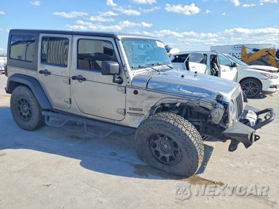 Czwarte zdjęcie samochodu z boku: 2017 JEEP WRANGLER UNLIMITED SPORT VIN:1C4HJWDG4HL654357 - miniatura