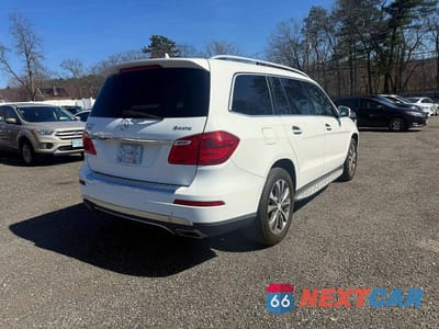 Czwarte zdjęcie samochodu z boku: 2014 MERCEDES-BENZ GL 450 4MATIC VIN:4JGDF7CE9EA314971 - miniatura