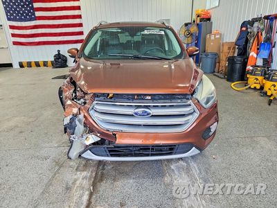 Piąte zdjęcie samochodu w środku: 2017 FORD ESCAPE TITANIUM VIN:1FMCU9J99HUA68039 - miniatura