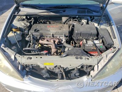 Zdjęcie 11 z 12 samochodu: 2003 TOYOTA CAMRY LE VIN:4T1BE32K23U762927 - miniatura