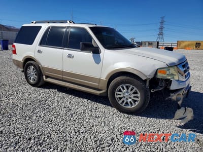 Czwarte zdjęcie samochodu z boku: 2011 FORD EXPEDITION XLT VIN:1FMJU1J52BEF38998 - miniatura