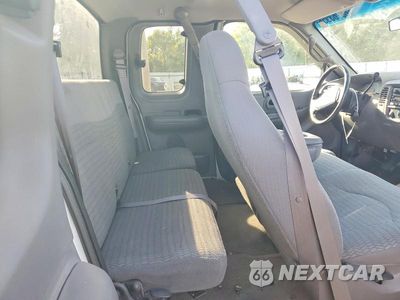 Zdjęcie 10 z 12 samochodu: 2000 FORD F150 VIN:1FTRX17L9YNC27730 - miniatura