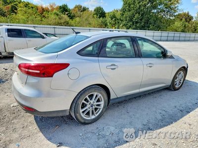 Trzecie zdjęcie samochodu z tyłu: 2018 FORD FOCUS SE VIN:1FADP3F23JL294829 - miniatura
