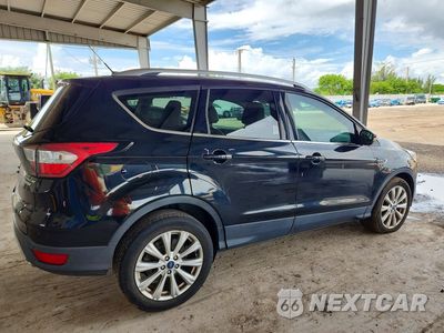 Trzecie zdjęcie samochodu z tyłu: 2017 FORD ESCAPE TITANIUM VIN:1FMCU0JD1HUC73287 - miniatura