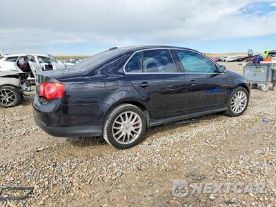 Trzecie zdjęcie samochodu z tyłu: 2006 VOLKSWAGEN JETTA GLI OPTION PACKAGE 2 VIN:3VWXJ71K16M756671 - miniatura