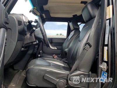 Zdjęcie 7 z 12 samochodu: 2016 JEEP WRANGLER UNLIMITED SAHARA VIN:1C4BJWEG8GL144113 - miniatura