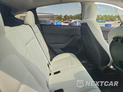 Zdjęcie 10 z 12 samochodu: 2022 TESLA MODEL Y VIN:7SAYGDEE8NF534921 - miniatura