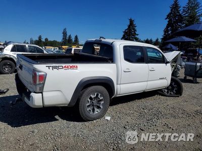 Trzecie zdjęcie samochodu z tyłu: 2021 TOYOTA TACOMA TRD OFF-ROAD VIN:5TFCZ5AN2MX268510 - miniatura