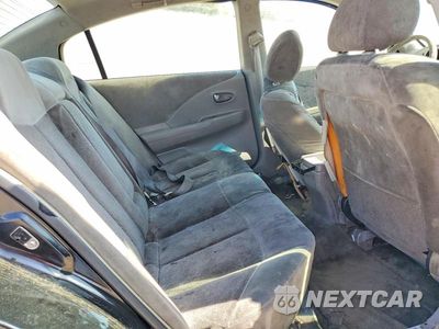 Zdjęcie 10 z 12 samochodu: 2003 NISSAN ALTIMA 2.5 VIN:1N4AL11D73C340046 - miniatura