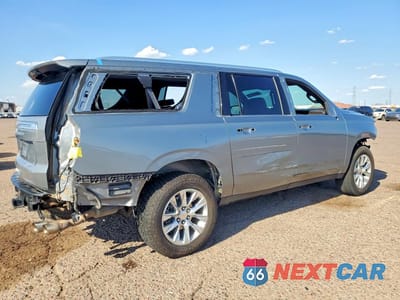 Trzecie zdjęcie samochodu z tyłu: 2023 CHEVROLET SUBURBAN C1500 PREMIER VIN:1GNSCFKDXPR520805 - miniatura