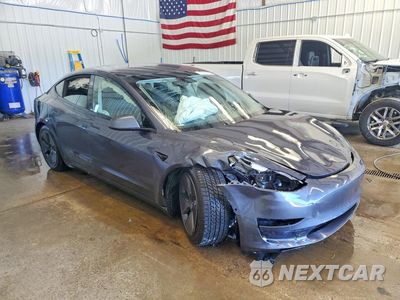 Czwarte zdjęcie samochodu z boku: 2022 TESLA MODEL 3 VIN:5YJ3E1EB5NF176789 - miniatura