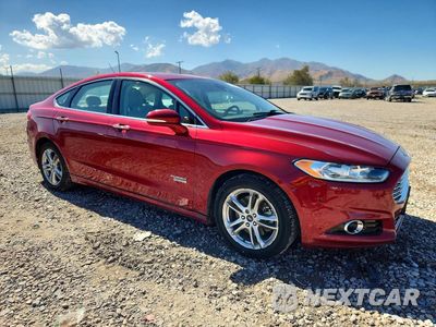 Czwarte zdjęcie samochodu z boku: 2016 FORD FUSION TITANIUM PHEV VIN:3FA6P0SU2GR315047 - miniatura