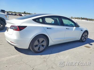 Trzecie zdjęcie samochodu z tyłu: 2023 TESLA MODEL 3 VIN:5YJ3E1EAXPF467542 - miniatura