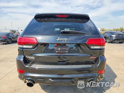 Zdjęcie 6 z 13 samochodu: 2014 JEEP GRAND CHEROKEE SRT-8 VIN:1C4RJFDJ9EC169577 - miniatura