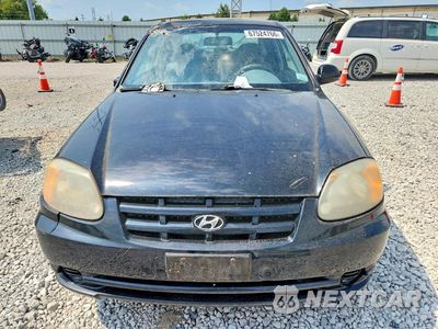 Piąte zdjęcie samochodu w środku: 2005 HYUNDAI ACCENT GLS VIN:KMHCG35CX5U323559 - miniatura