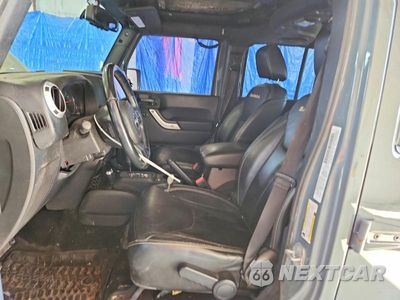 Zdjęcie 7 z 13 samochodu: 2014 JEEP WRANGLER UNLIMITED SAHARA VIN:1C4BJWEG7EL272923 - miniatura