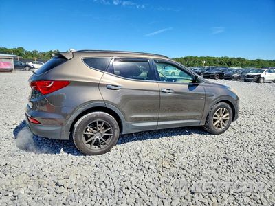 Trzecie zdjęcie samochodu z tyłu: 2014 HYUNDAI SANTA FE SPORT 2.0T VIN:5XYZUDLA1EG154371 - miniatura