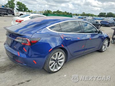 Trzecie zdjęcie samochodu z tyłu: 2018 TESLA MODEL 3 VIN:5YJ3E1EB6JF133900 - miniatura