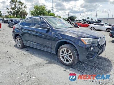 Czwarte zdjęcie samochodu z boku: 2016 BMW X4 XDRIVE28I VIN:5UXXW3C59G0R21597 - miniatura