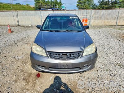 Piąte zdjęcie samochodu w środku: 2004 HONDA CIVIC LX VIN:2HGES16624H609224 - miniatura