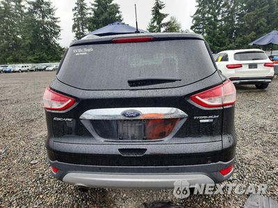 Zdjęcie 6 z 13 samochodu: 2016 FORD ESCAPE TITANIUM VIN:1FMCU9JX3GUA07802 - miniatura