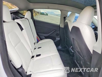 Zdjęcie 10 z 13 samochodu: 2023 TESLA MODEL Y VIN:7SAYGDEF4PF690045 - miniatura