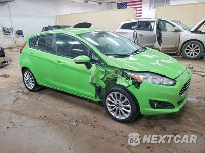 Czwarte zdjęcie samochodu z boku: 2014 FORD FIESTA SE VIN:3FADP4EJ2EM163054 - miniatura