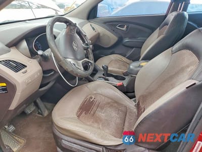 Zdjęcie 7 z 13 samochodu: 2011 HYUNDAI TUCSON GLS VIN:KM8JU3AC2BU126595 - miniatura
