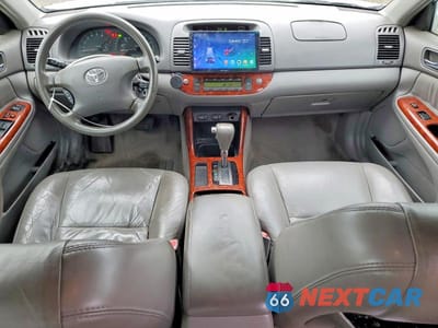 Zdjęcie 8 z 12 samochodu: 2004 TOYOTA CAMRY XLE VIN:4T1BE30KX4U275365 - miniatura