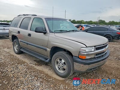Czwarte zdjęcie samochodu z boku: 2001 CHEVROLET TAHOE C1500 VIN:1GNEC13T41J153816 - miniatura