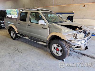Czwarte zdjęcie samochodu z boku: 2000 NISSAN FRONTIER XE VIN:1N6ED27T2YC392394 - miniatura