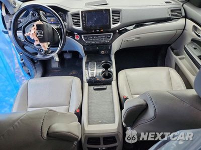 Zdjęcie 8 z 14 samochodu: 2017 HONDA PILOT TOURING VIN:5FNYF6H96HB083194 - miniatura